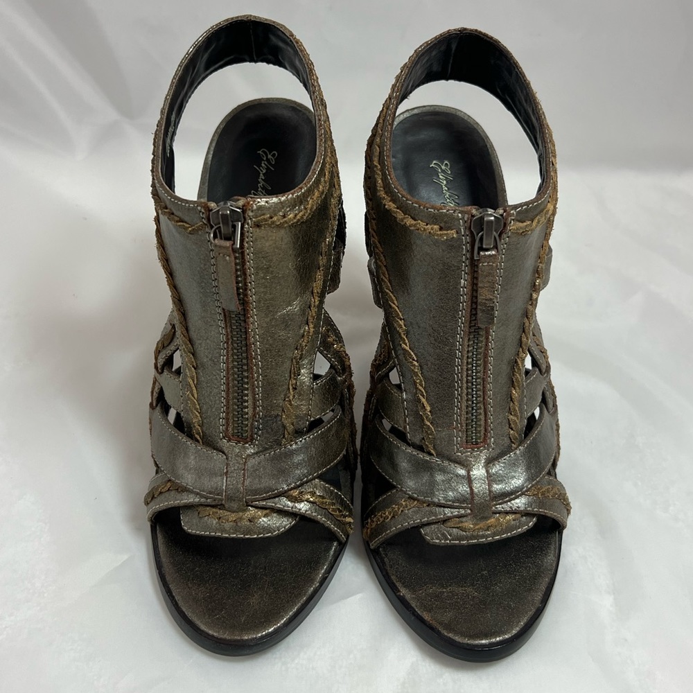 Elizabeth and James silver with gold trim heels